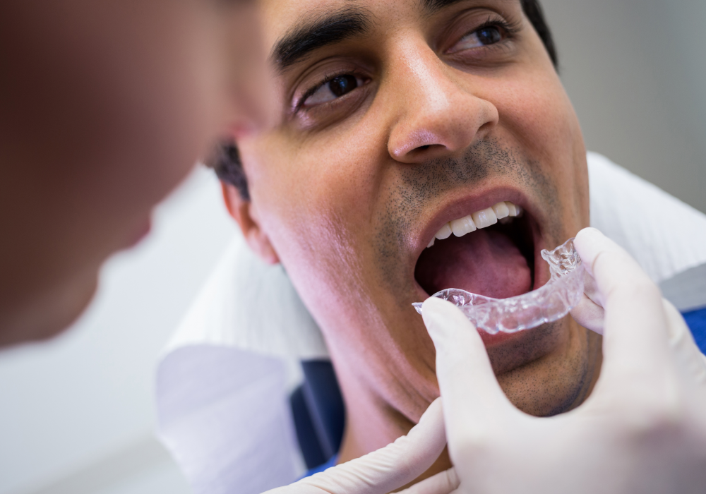 Before and after orthodontic treatment showing aligned smile